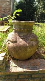 Nice old cement pot with fish in relief