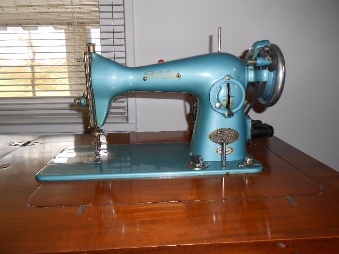 Bel Aire teal sewing machine + cabinet