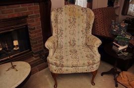 PAIR OF WING BACKED UPHOLSTERED CHAIRS