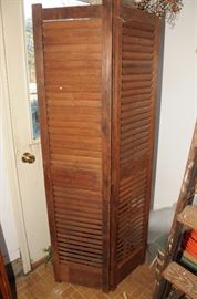 SHUTTERS MADE INTO ROOM DIVIDER