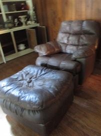 brown leather chair and ottoman