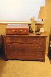 Antique Tiger Oak Serpentine 4 Drawer Dresser, Vintage Suitcase, Lamp