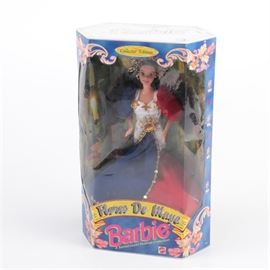 1998 Santacruzan Festival Collection "Flores De Mayo" Barbie: A “Flores De Mayo” Santacruzan Festival Collection Barbie. This brunette Barbie is presented in her original packaging and is presented in a red, white and blue dress with gold tone accents. The Barbie depicts Reyna Banderada, which represents Christianity coming to the Philippines. The festival of Flores de Mayo is held each May and celebrates Santacruzan, honoring Helena of Constantinople allegedly finding the “True Cross”.