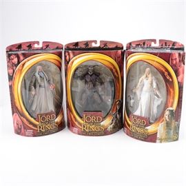 "Lord of the Rings" Action Figures: A trio of Lord of the Rings actions figures. The action figures included in this collection are Galadriel Lady of Light, Saruman the White and a Easterling action figure with highly detailed armor. The Galadriel figure is from the motion picture Lord of the Rings The Fellowship of the Ring while the Saruman and Easterling action figures are from the Lord of the Rings The Two Towers motion picture.
