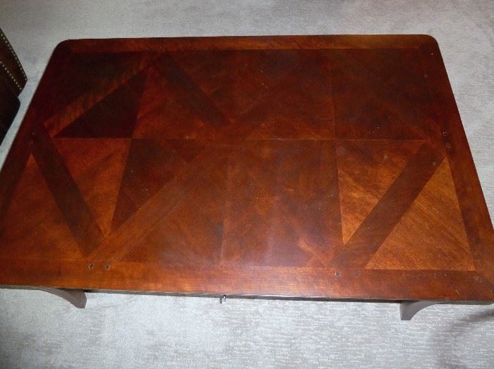 Large dark cherry coffee table with two drawers by Bassett.  48" x 32"