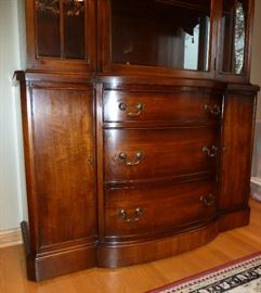 Vintage mahogany china cabinet by Landstrom Furniture.  Glass door (with key), wood shelves with plate grooves, 3 large drawers, 2 side doors with storage areas.  47" wide, 18" deep, 75" tall
