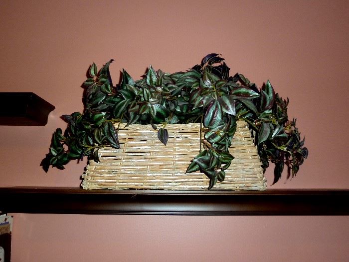 Large basket with artificial vines.  Basket is 29" long