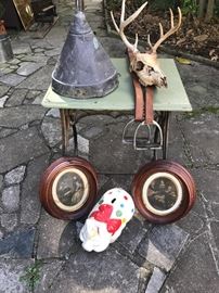 Copper funnel, deer rack, metal stand, walnut oval shadow box frames and vintage piggy bank