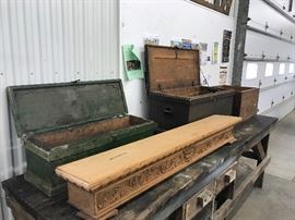 Primitive tool and other trunks, carved oak mantle