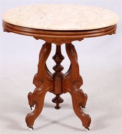 2470  LATE VICTORIAN CARVED WALNUT OVAL SIDE TABLE WITH BEVELLED MARBLE TOP, C. 1900, H 30", W 21", L 29"