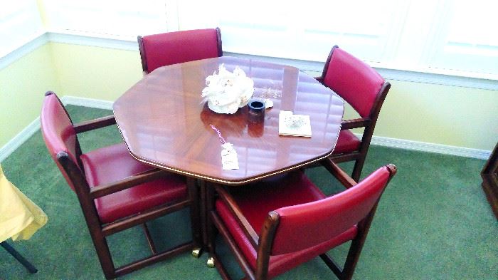 Great game table, or kitchen table.  Chairs roll so nicely, even on the carpet!