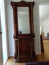 Wonderful vintage mahogany hall tree, with a mail slot, not female.