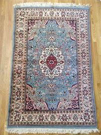 Not a good rug. There has to be a dud somewhere and this is it. It's a 1960's Persian rug, coarsely woven, with an ugly color story. The pic makes it appear much better. What do you want me to say?