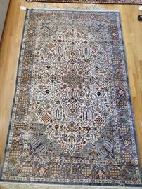 Another really nice Persian silk rug, hand woven, measures 5' 7" x 8' 2".
