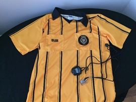 Referee jersey, stopwatch and whistle