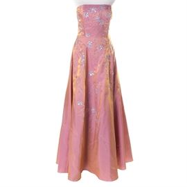 Sean Collection Strapless Formal Dress: A Sean Collection strapless formal dress. The dress features rose tone fabric with a gold tone shimmer finish, a fitted bodice, a flared skirt, a corset style lace up back and a zipper closure. The party dress is embellished with meandering vines of beaded stems and sequined flowers.