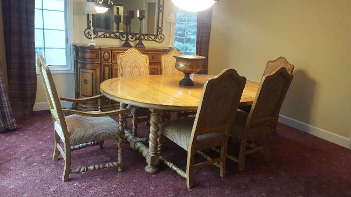 $300  Drexel Heritage wood table with 6 chairs, one leaf    measures 36" round, leaf measures  24"  total with leaf is 60"