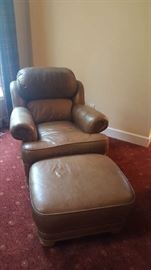 $125  Leather chair with footstool  