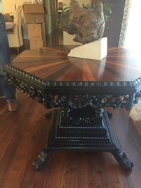 Heavily carved and inlaid Table