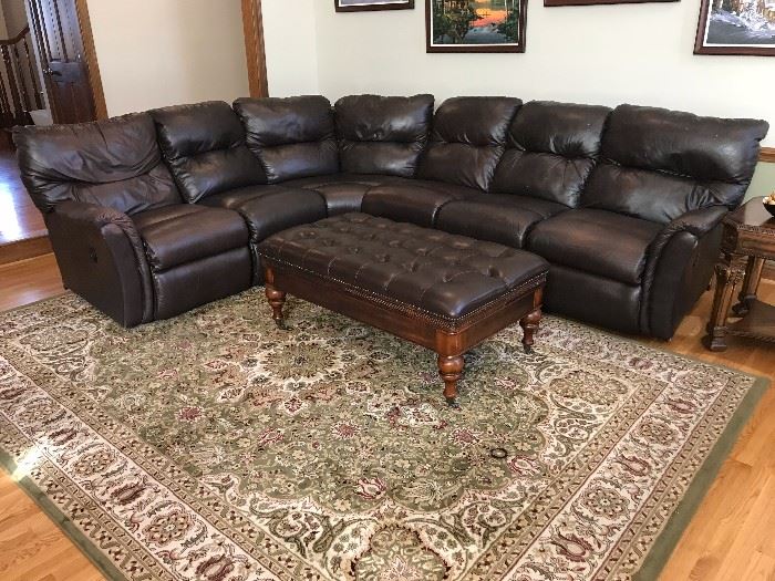 Large brown leather sectional sofa