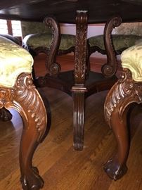 Hand carved round Mahogany dining room table w/7 custom upholstered wooden chairs 