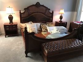 Hand carved king size bedroom suite featuring bed, dresser, chest, two nightstands & storage chest