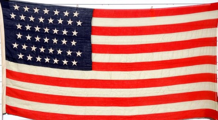 Choice 44 Star American Flag.  
Circa 1890 admission of Wyoming to Union, signed Lamprell & Marble Mfrs Boston Mass.  6’ x 12’  Excellent condition.  Original canvas storage bag.
