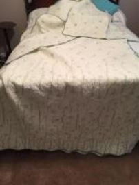 Green trimed quilt and shams