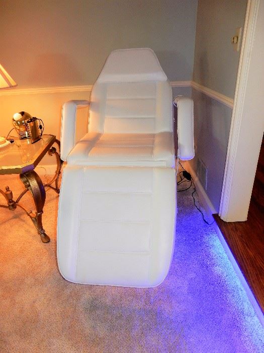 SPA CHAIR /ELECTRIC FACIAL CHAIR $ 750.00
46 X 33  6” FULLY EXTENDED  
White Leather, electric adjustment up/down, includes Stool and Stand for supplies
