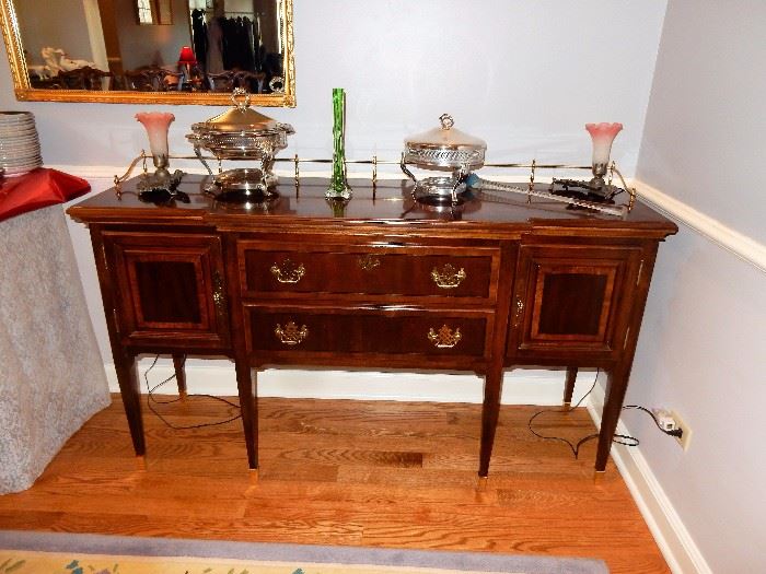 CHERRY WOOD FINISH ASIAN THEMED DINING ROOM SUITE  $1,800.00
INCLUDES, DINING TABLE (SHOWING WITH TWO LEAVES) 8 CHAIRS, BUFFET, CHINA CABINET, AND SERVER. 
Table fully extended is 45 x 100 x 30” high, leaves are 15 inches
China Cabinet is 63 x 18 x 89 high
Buffet is 63 x 35 x 18 
Server is 42 x 20 x 33 and fully open is 57 inches
Chairs neutral crème upholstered seat, 40 “ high to top of chair and seat is 17 x 17 
