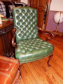 TUFTED LEATHER ARM CHAIR ONE OF TWO AVAILABLE
