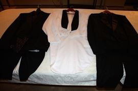 Men's tuxes with tails.