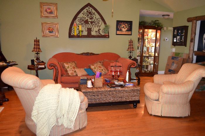 This house is packed full! Arched back sofa, 2 comfortable side chairs; coffee table with storage; many decorator accessories.