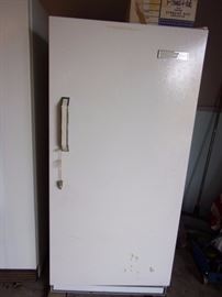 Upright freezer with lock and key