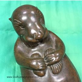  Bronze Sea Otter on Bronze Base signed "Siebert 1981 46/300" in good condition

approximately 23"l x 8 1/2"w x 6"h 