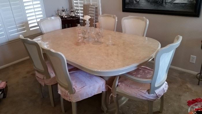 Pretty dining room set with six chairs.  