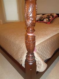 closeup of the corner post of the bed