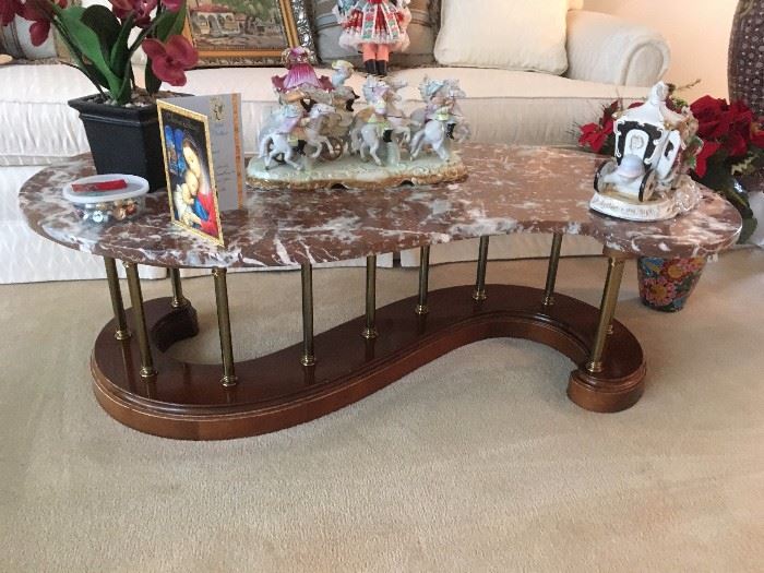 marble topped S-shaped coffee table