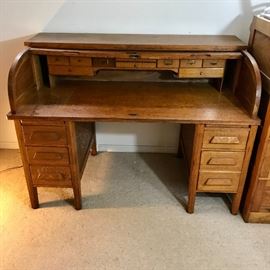  Antique rolltop oak desk with 4 wheel, swivel desk  http://www.ctonlineauctions.com/detail.asp?id=649282