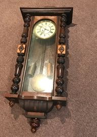  Wood wall clock with pendulum  http://www.ctonlineauctions.com/detail.asp?id=649308