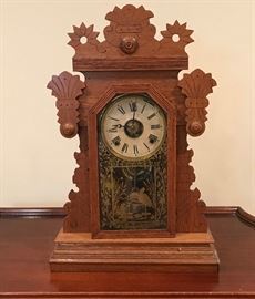  Wood mantle clock  http://www.ctonlineauctions.com/detail.asp?id=649318