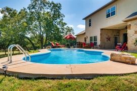 Poolside furniture, loungers, table and chairs, etc.