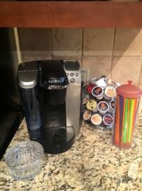 Keurig and sugar bowl.