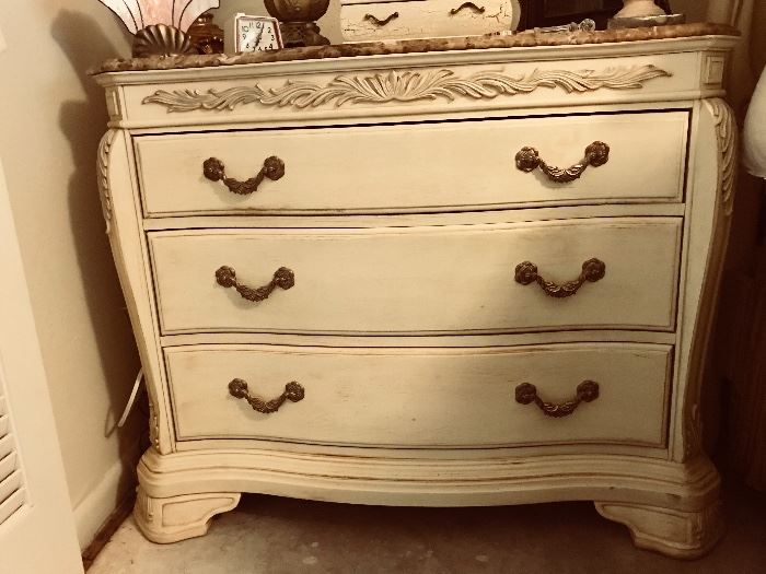 Bob Mackie Home Collection Ivory & Gilt Three Drawer Chest with Acanthus Leaf Detail & Café-Au-Lait
Marble Top  (41” x 34” x 21”)   750.—
