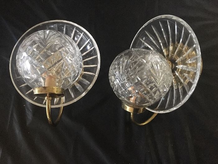 A pair of Waterford Cut Crystal wall sconces.  Each crystal section has the Waterford mark.   These are prime examples why when one remodels a home one should never throw out the older fixtures, some times they are better than what you replace them with in that fixer upper.