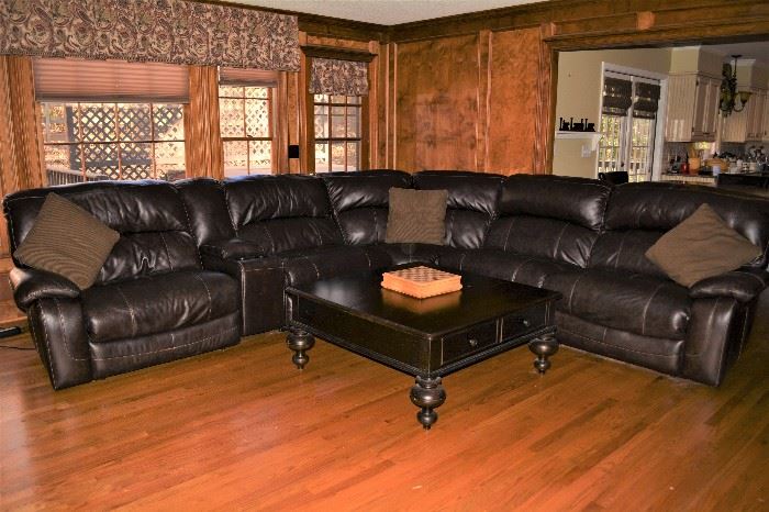 Leather Reclining Sofa, Reclines on both ends with a push of a button! Reclines all of the way flat and is very comfortable.