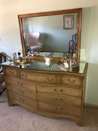 Glass topped dresser with mirror