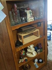 Display case, lots of vases, stemware, clocks, serving trays, more