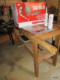 This is a great idea....work table on (round wood front wheels) wheels, roll to where you need it most.