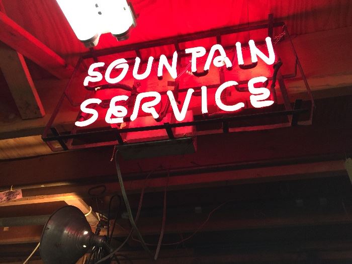 neon Fountain Service sign